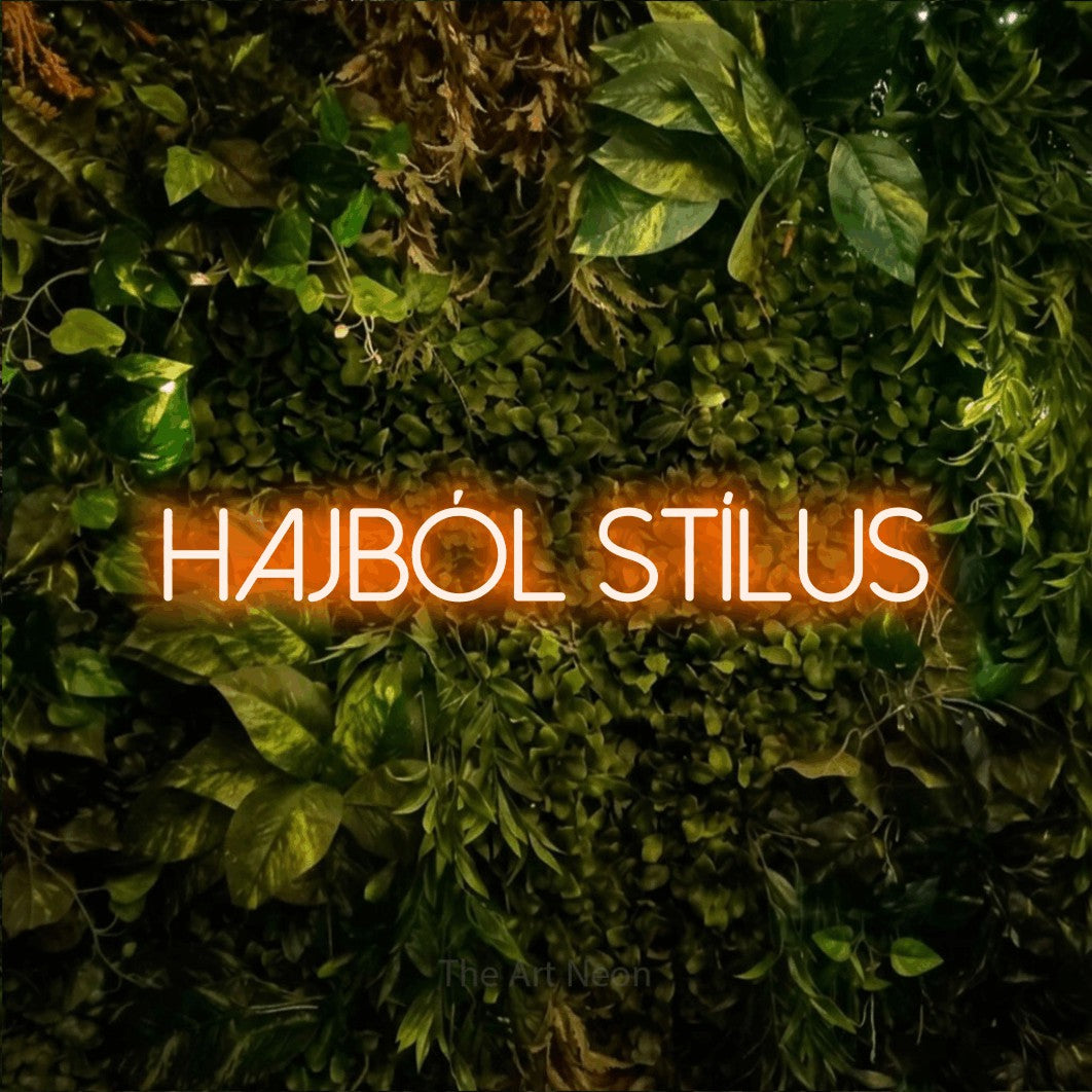 LED neon sign reading “HAJBÓL STÍLUS”, arranged in a single line.