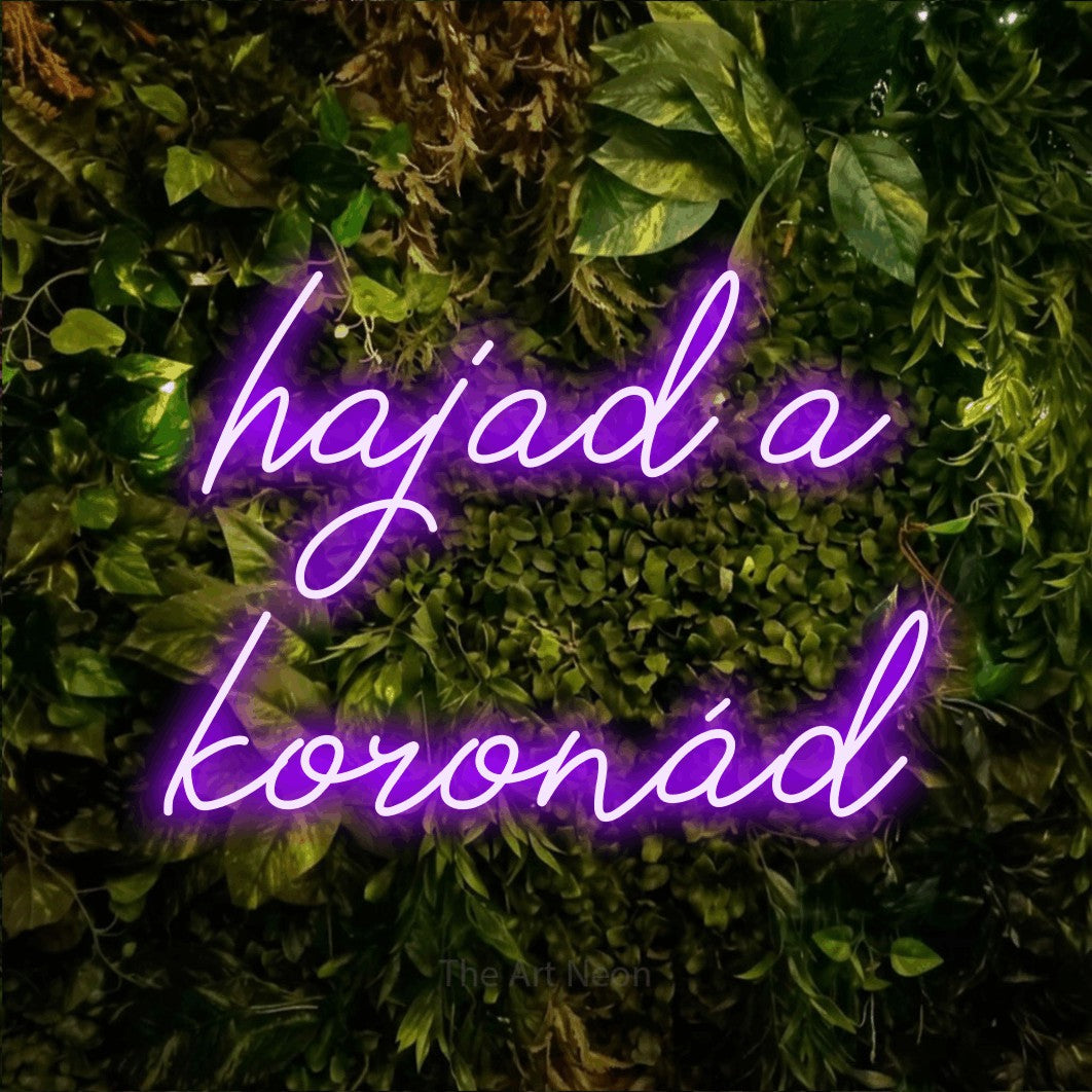 LED neon sign reading “hajad a koronád”, arranged in two lines.