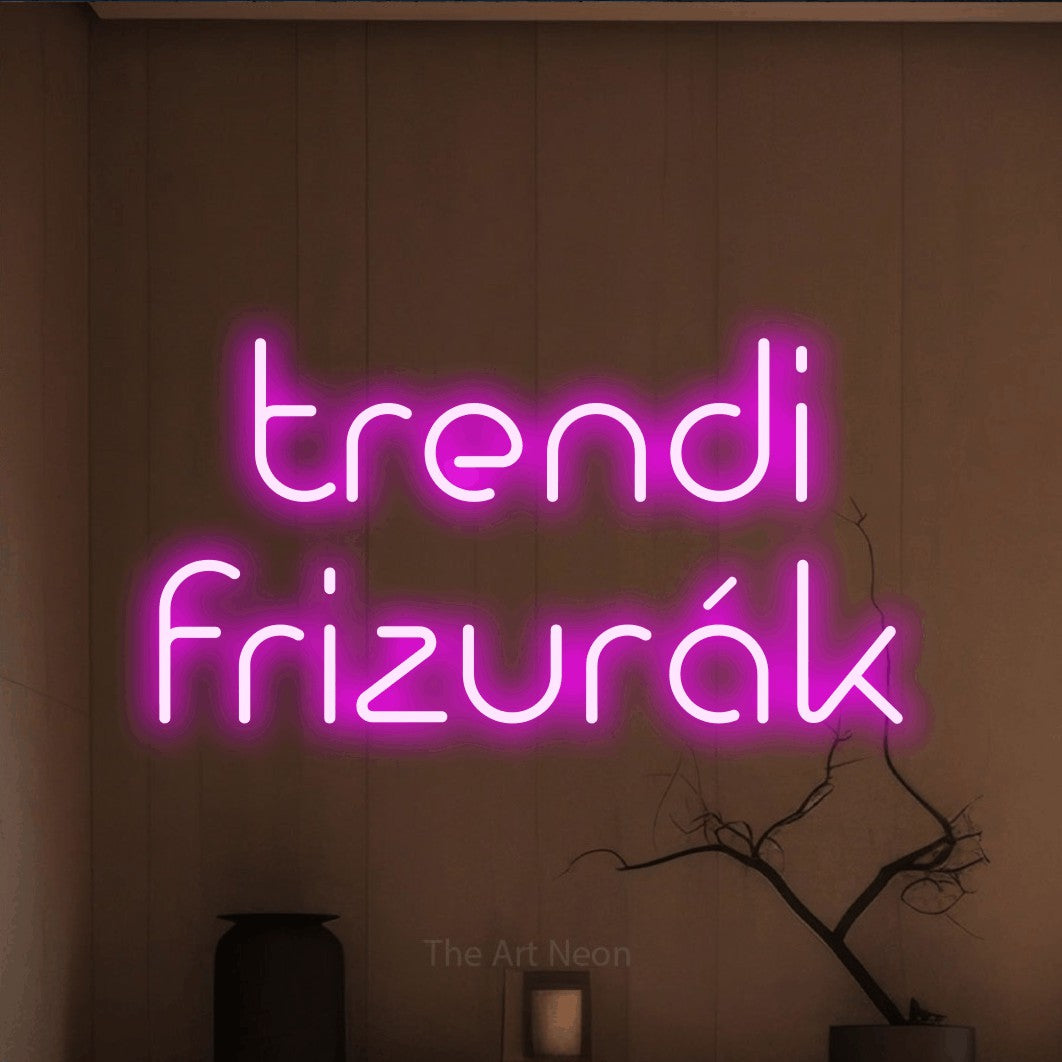 LED neon sign reading “trendi frizurák”, arranged in two lines.