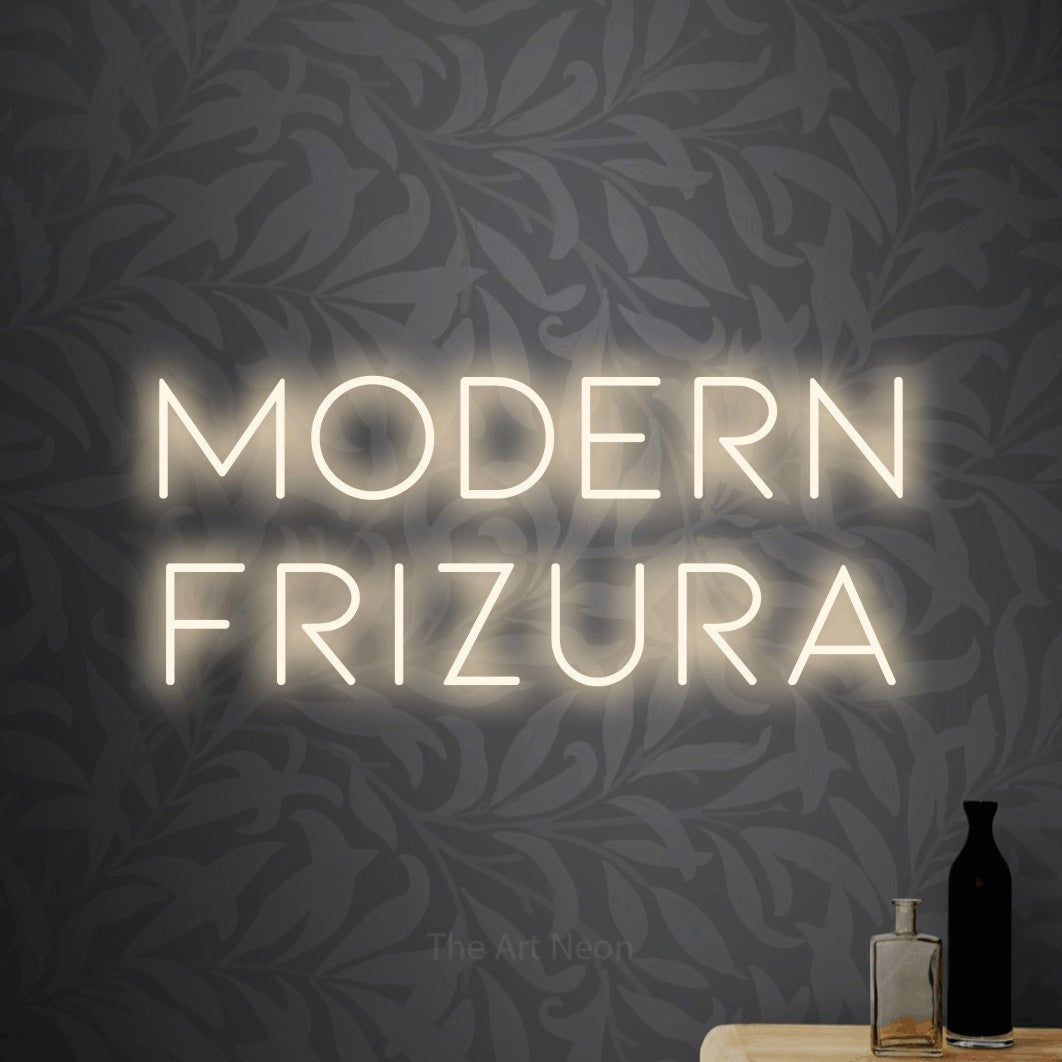 LED neon sign reading “modern FRIZURA”, arranged in two lines.