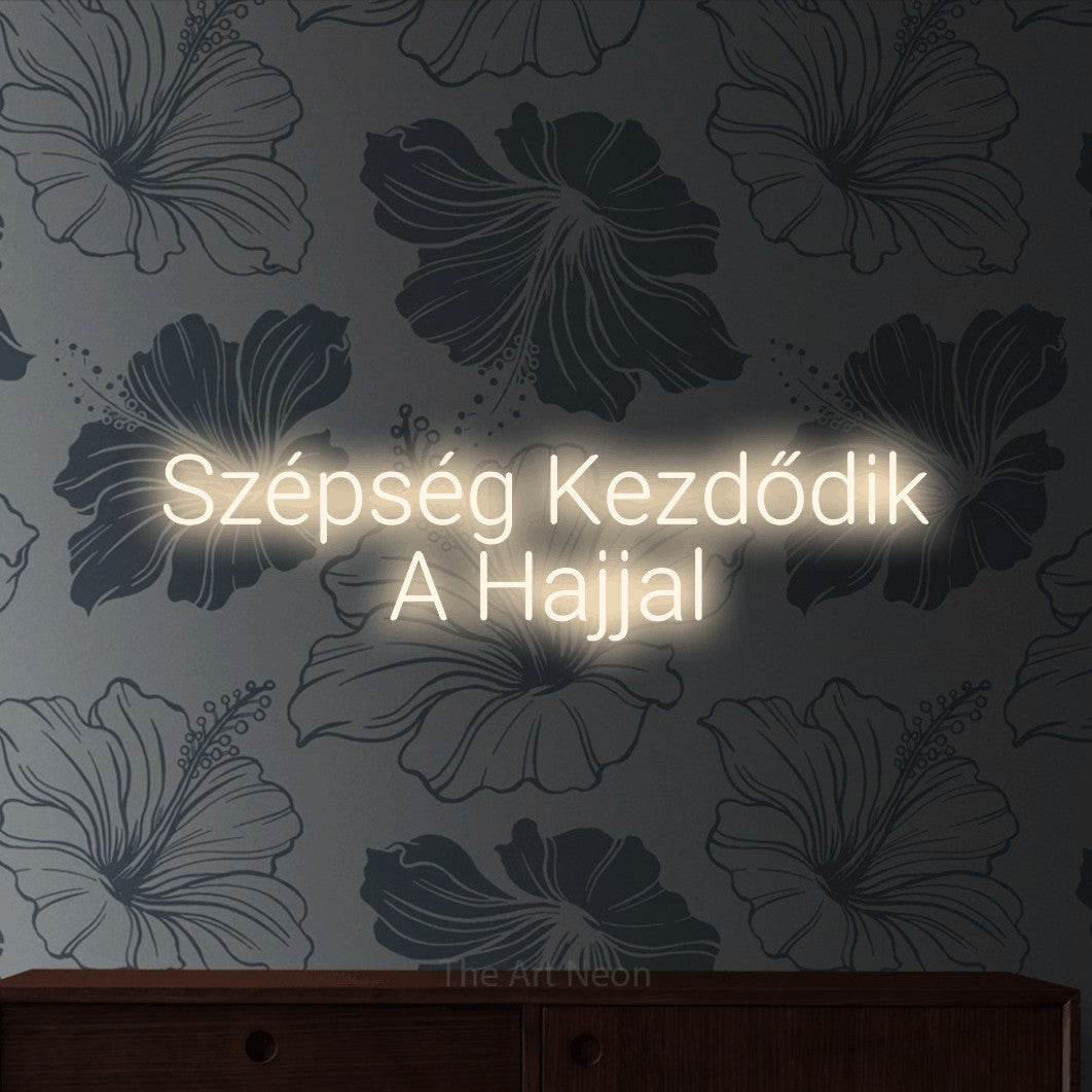 LED neon sign reading “Szépség Kezdődik A Hajjal”, arranged in two lines.