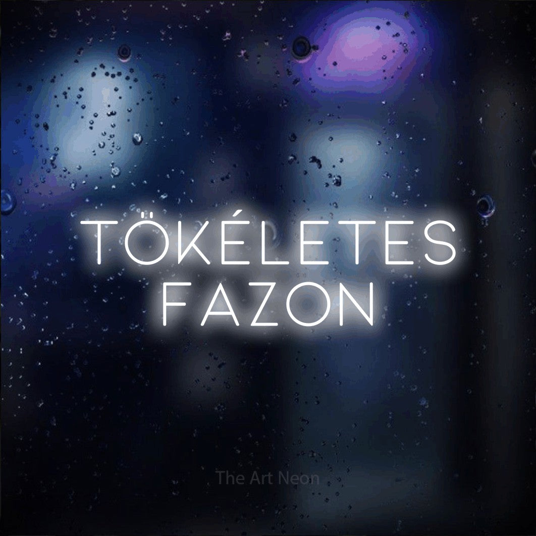 LED neon sign reading “Tökéletes Fazon”, arranged in two lines.
