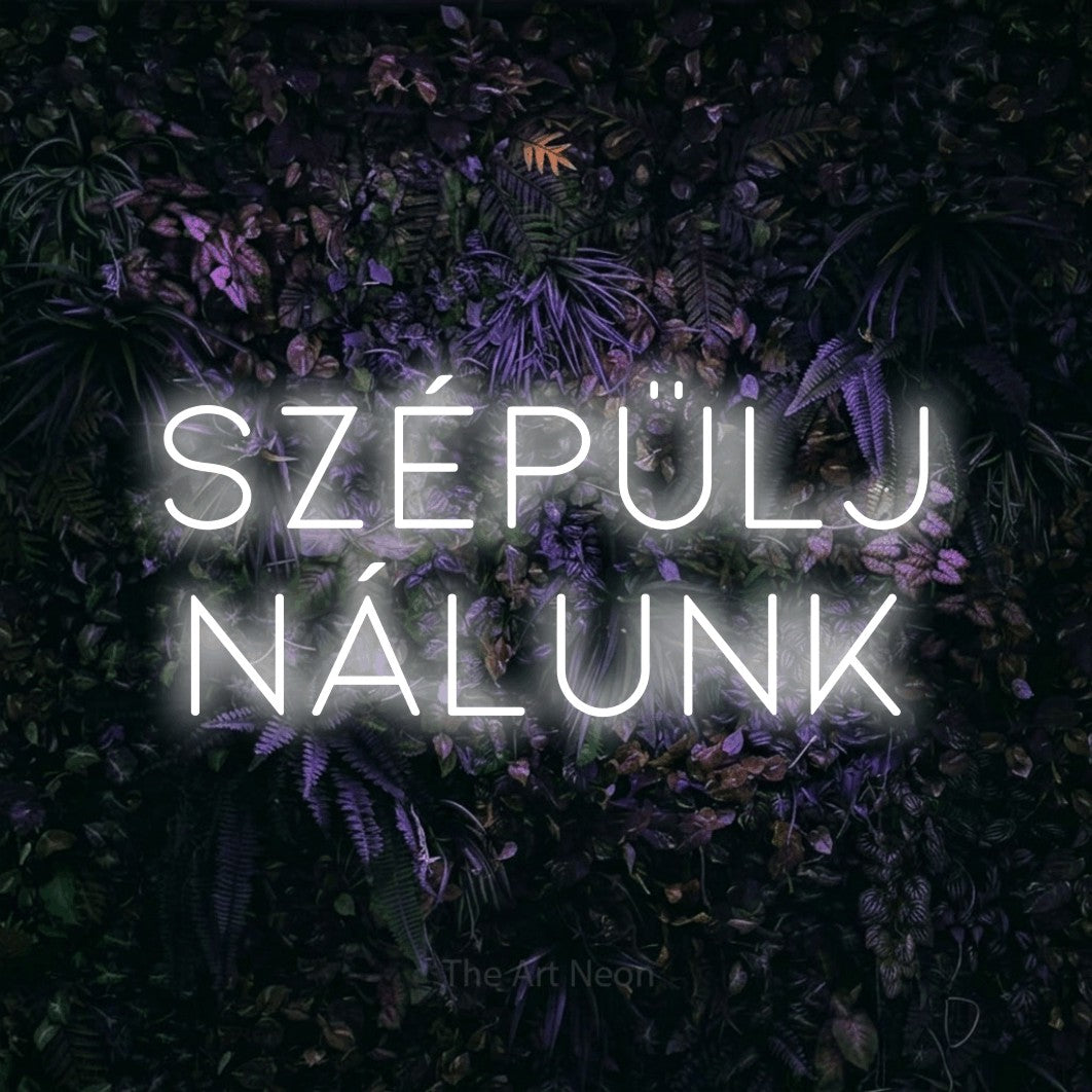 LED neon sign reading “Szépülj Nálunk”, arranged in two lines.