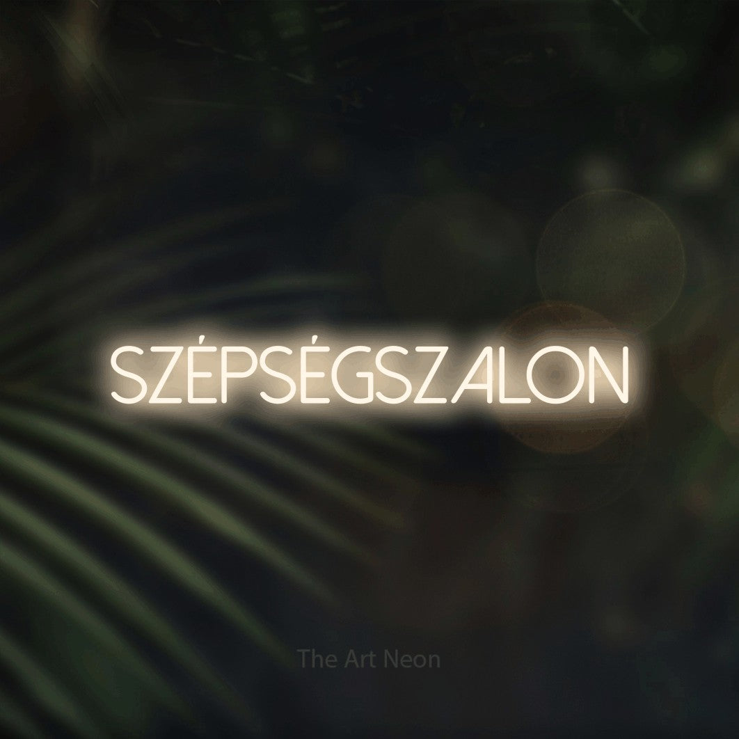 LED neon sign reading “Szépségszalon”, arranged in a single line.