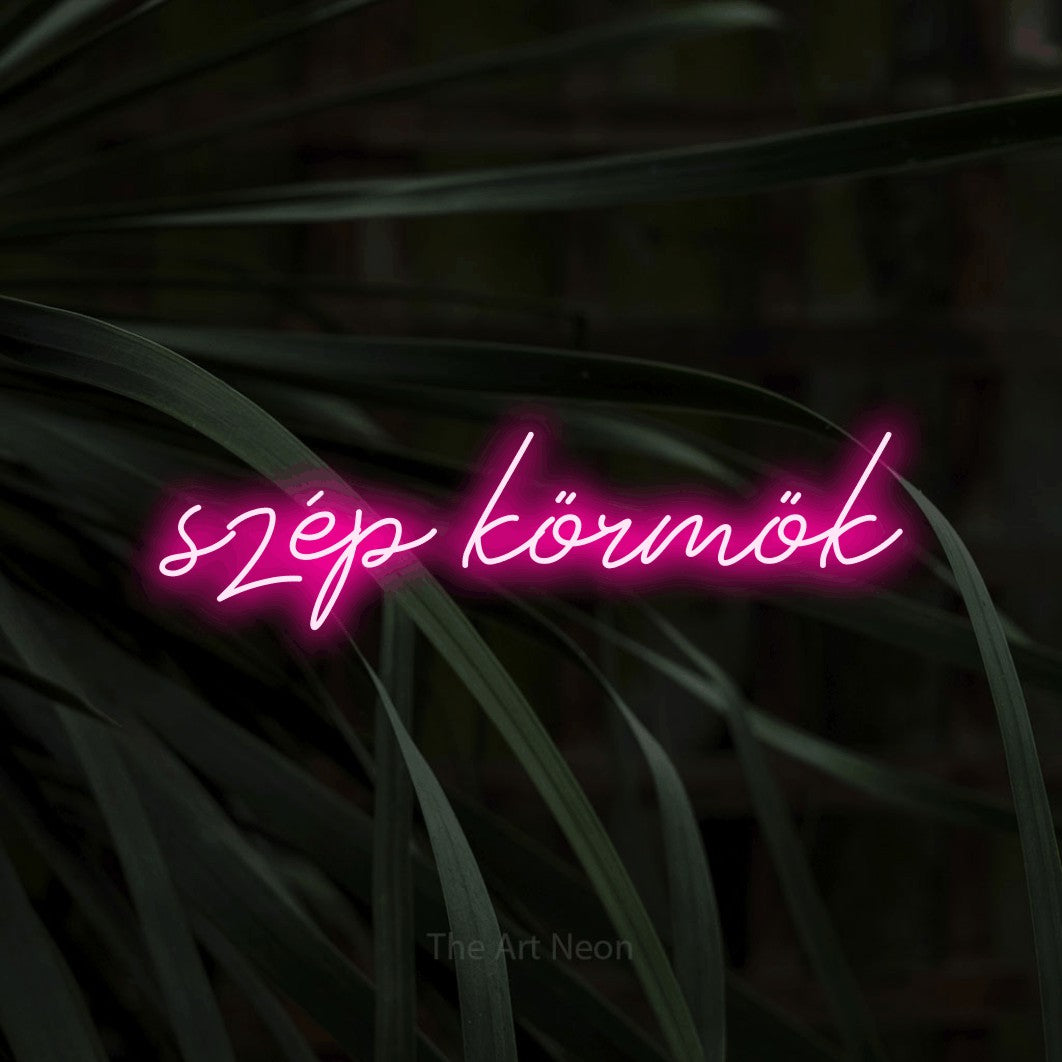 LED neon sign reading “szép körmök”, arranged in a single line.