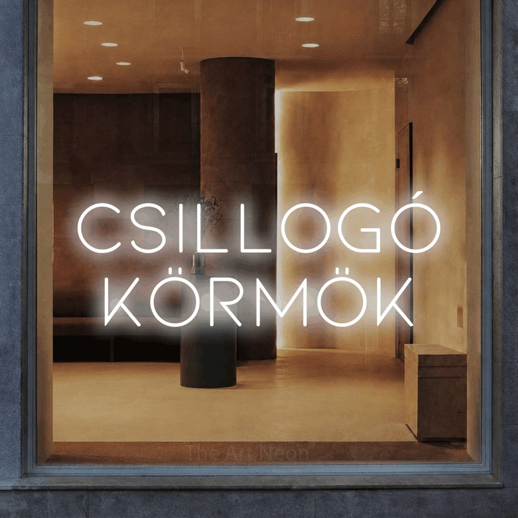 LED neon sign reading “Csillogó Körmök”, arranged in two lines.