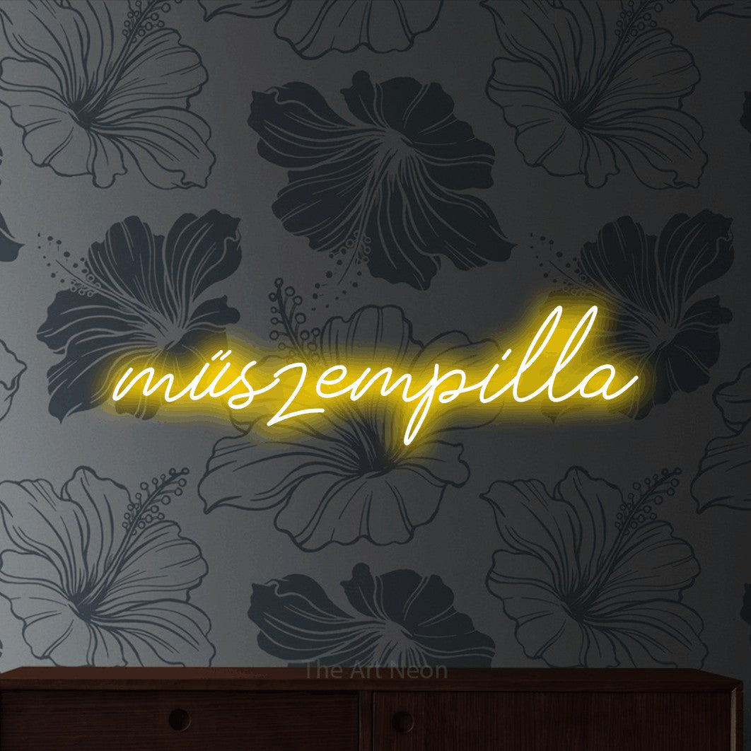 LED neon sign reading “műszempilla”, arranged in a single line.