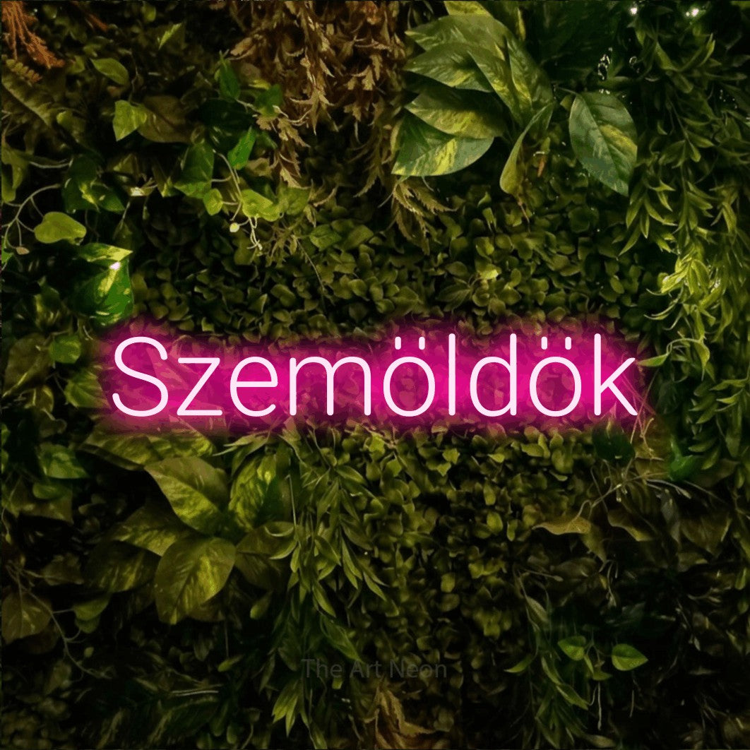 LED neon sign reading “Szemöldök”, arranged in a single line.
