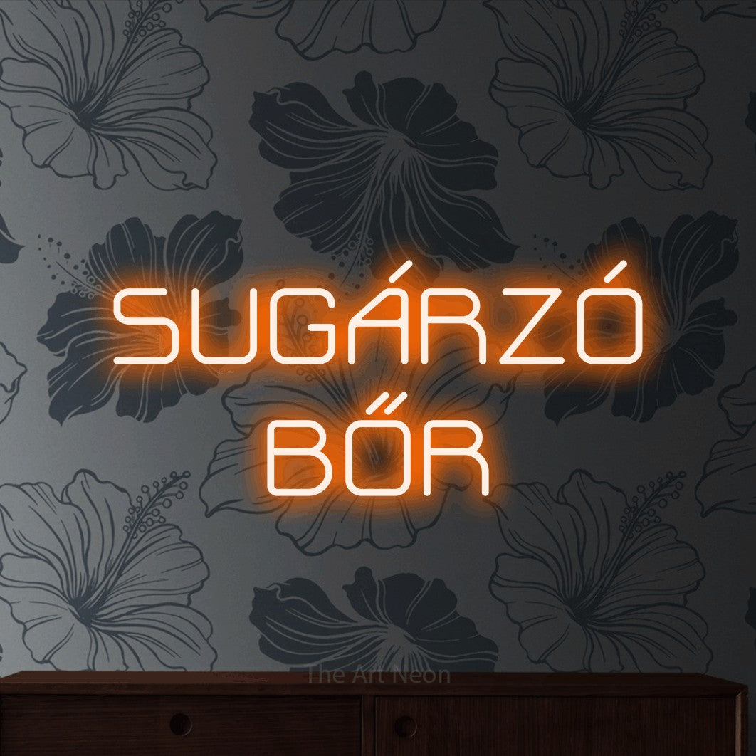 LED neon sign reading “SUGÁRZÓ BŐR”, arranged in two lines.