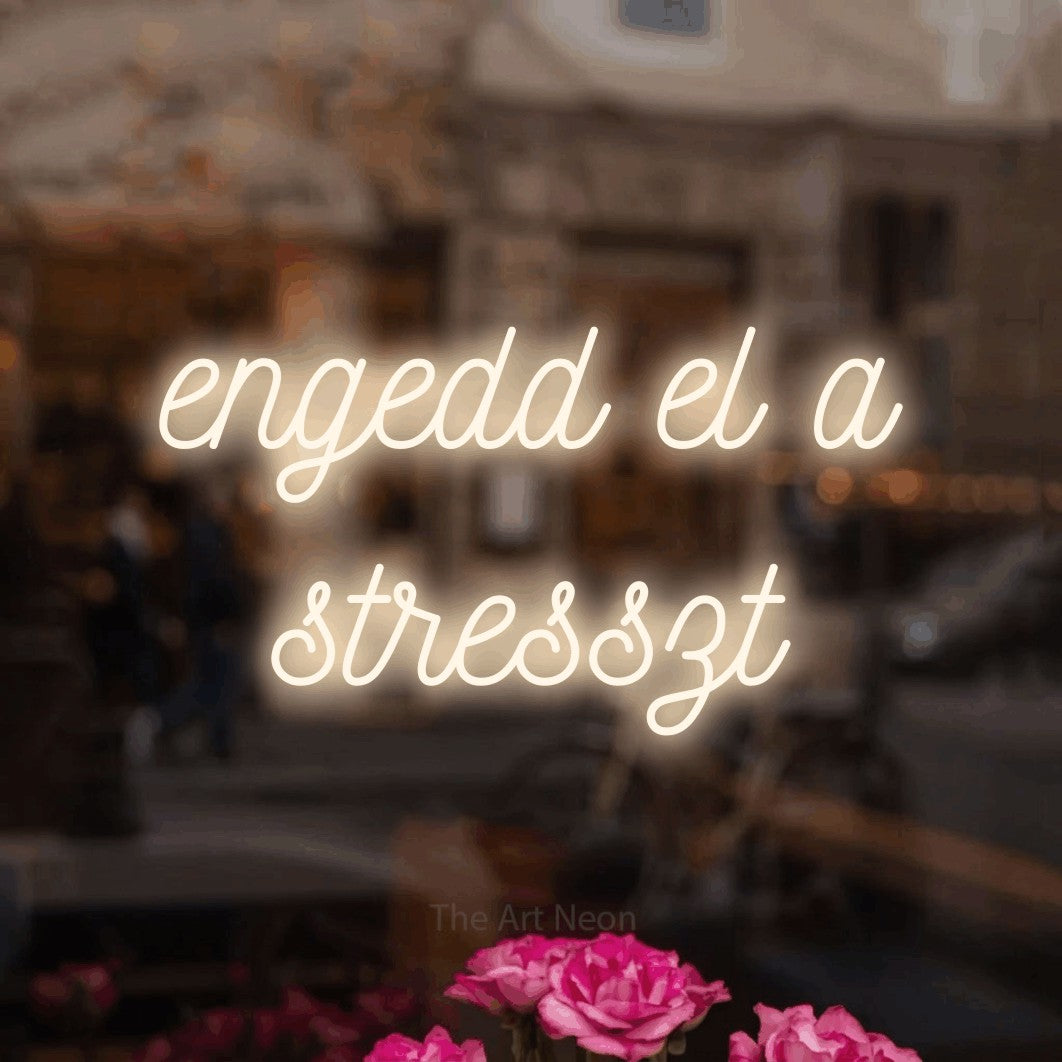 LED neon sign reading “engedd el a stresszt”, arranged in two lines.