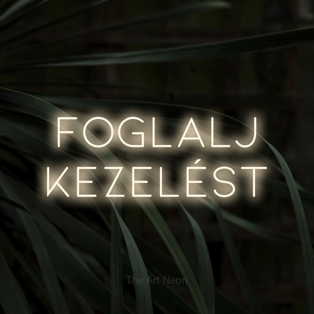 LED neon sign reading “Foglalj Kezelést”, arranged in two lines.