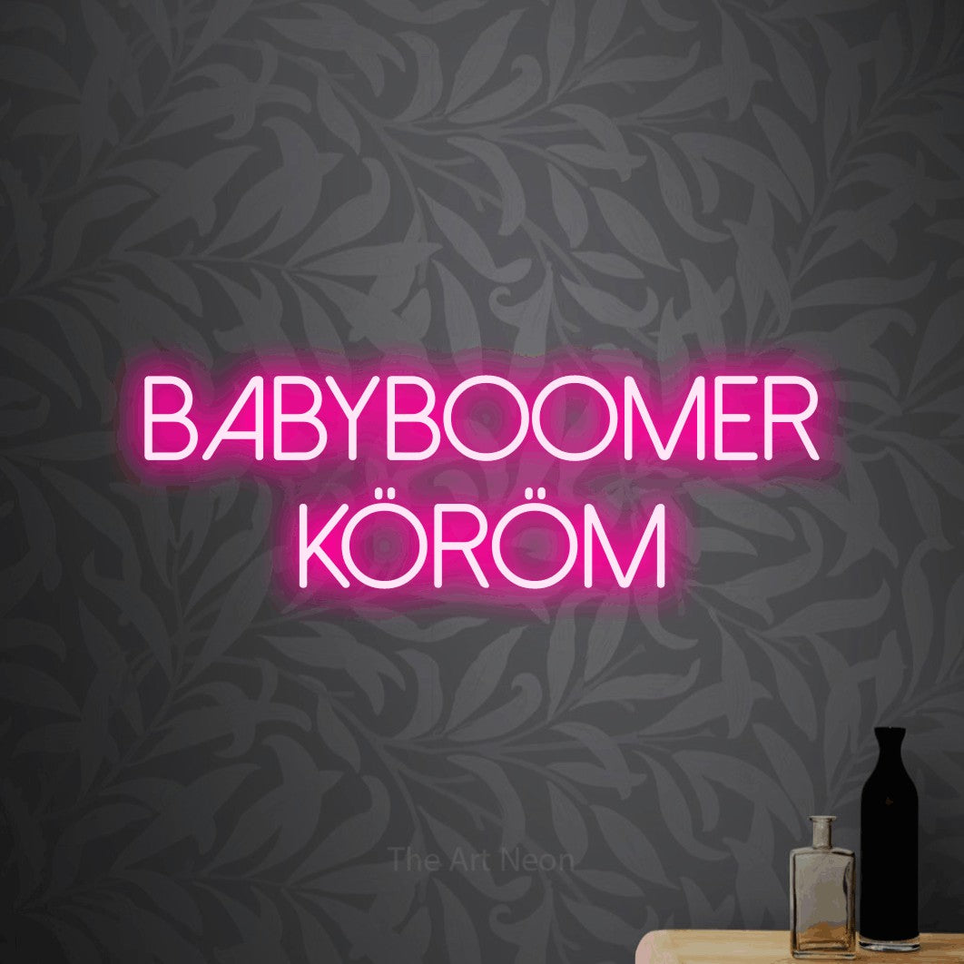 LED neon sign reading “Babyboomer Köröm”, arranged in two lines.