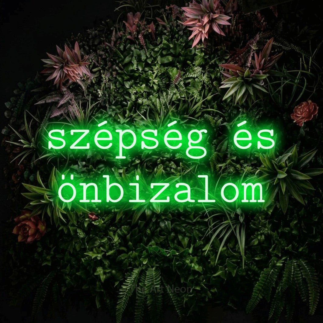 LED neon sign reading “szépség és önbizalom”, arranged in two lines.