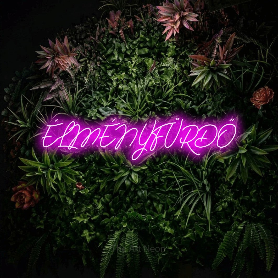 LED neon sign reading “ÉLMÉNYFÜRDŐ”, arranged in a single line.