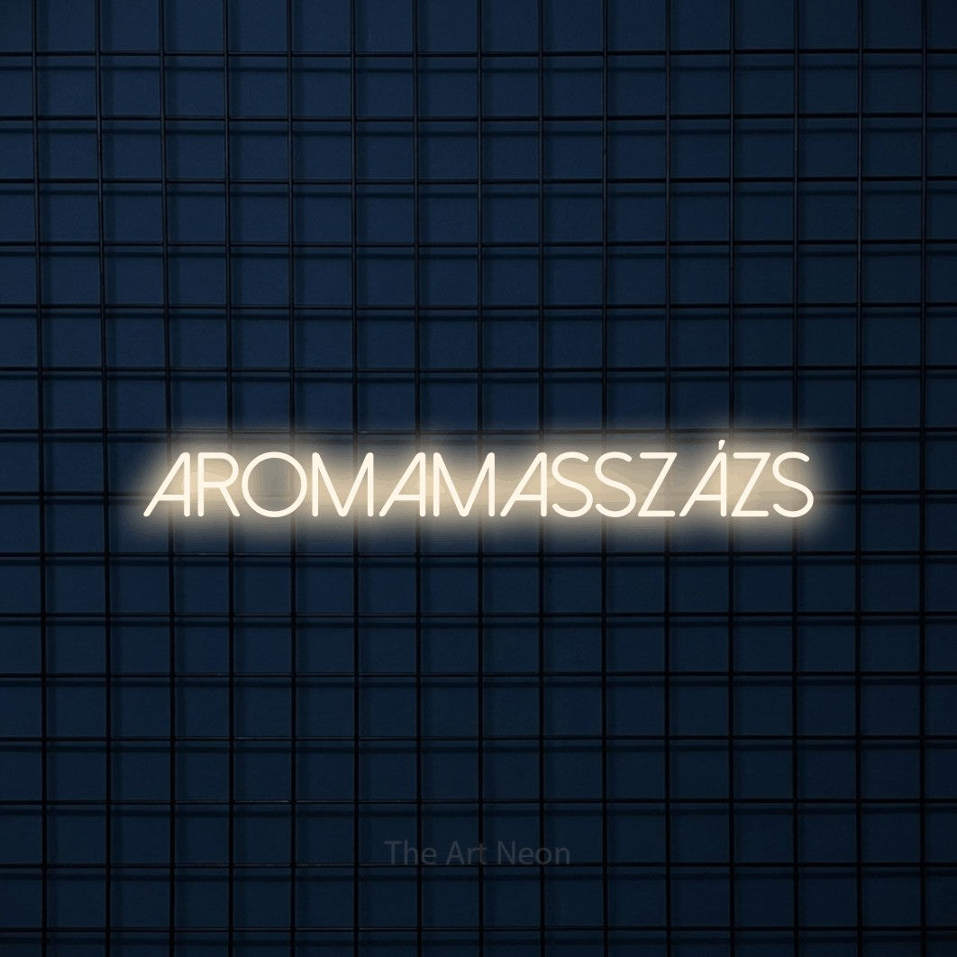 LED neon sign reading “AROMAMASSZÁZS”, arranged in a single line.