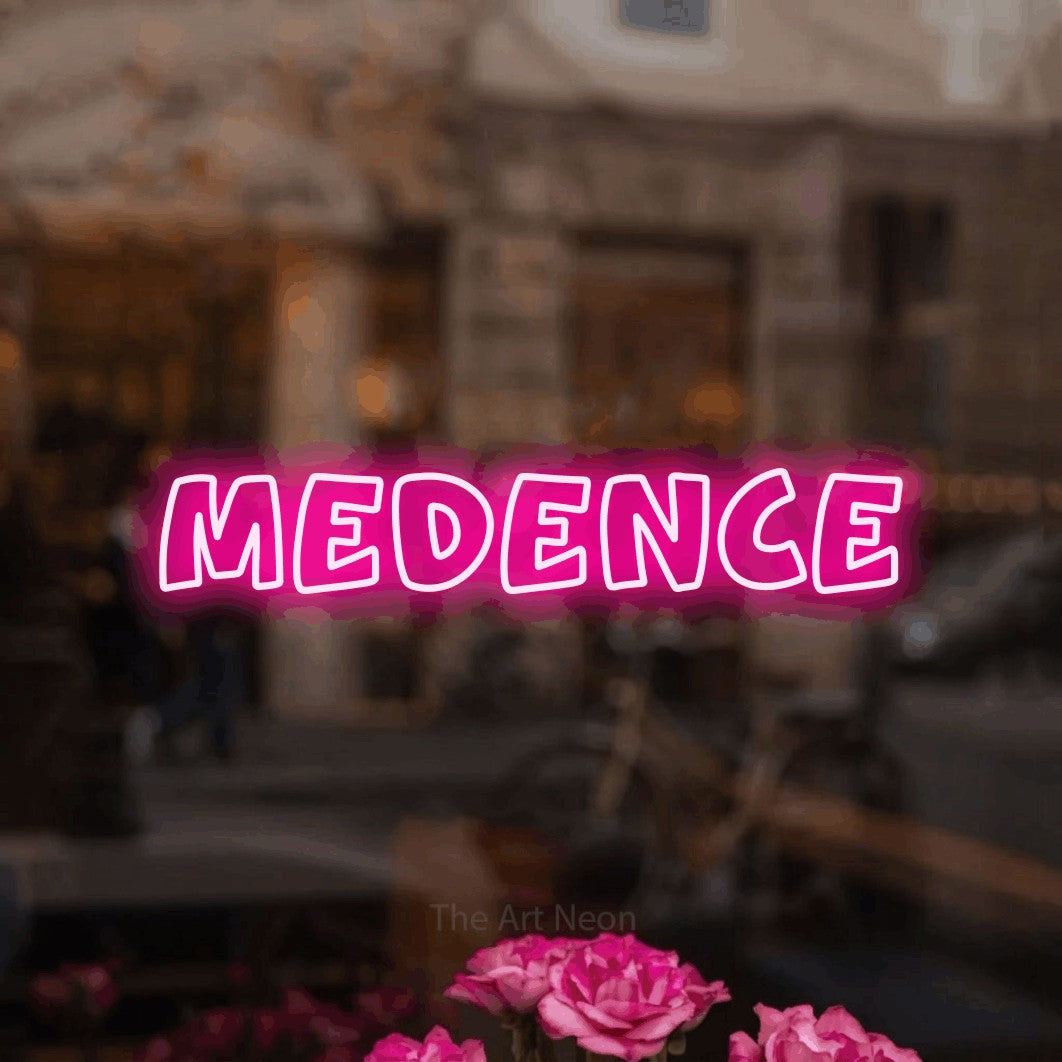 LED neon sign reading “Medence”, arranged in a single line.