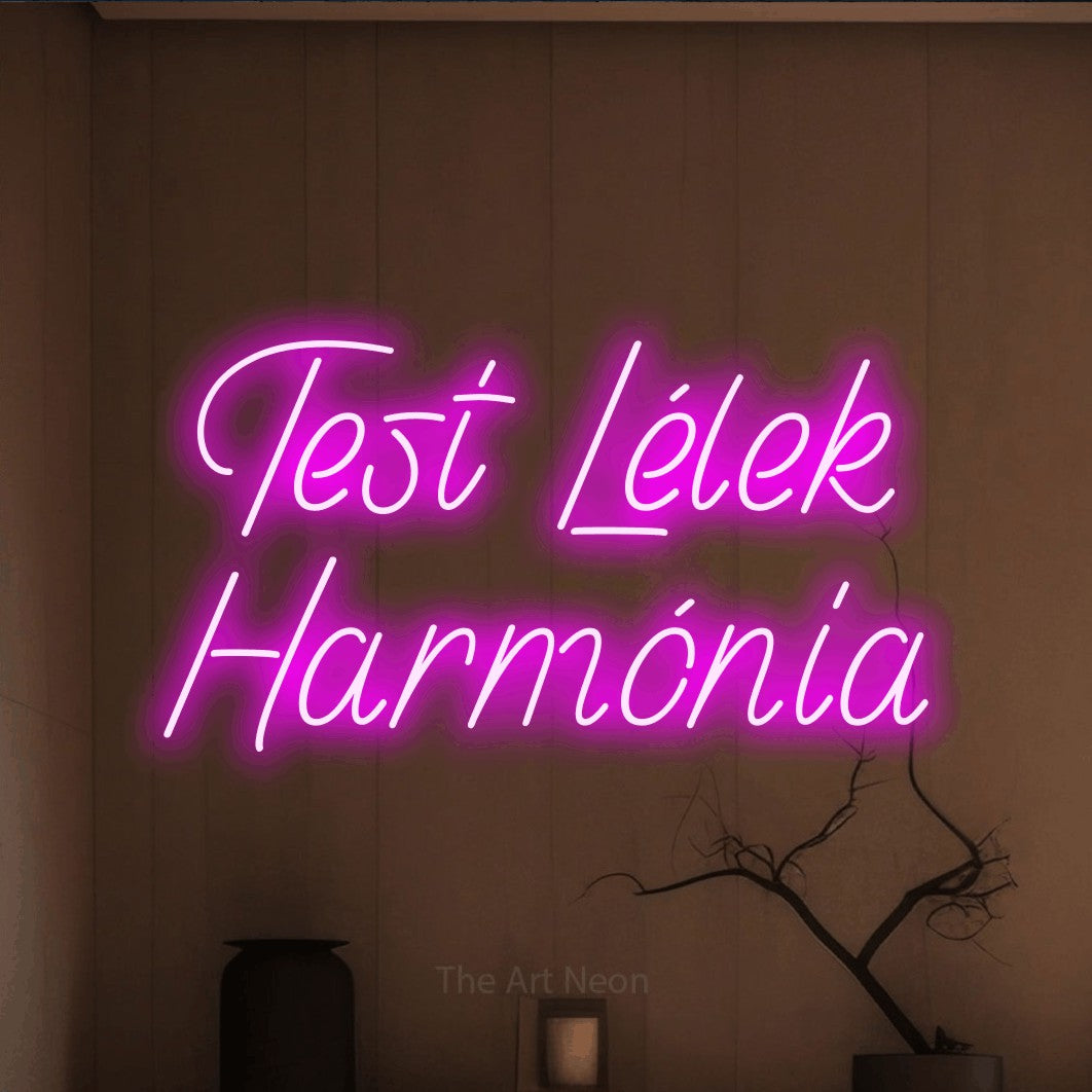 LED neon sign reading “Test Lélek Harmónia”, arranged in two lines.