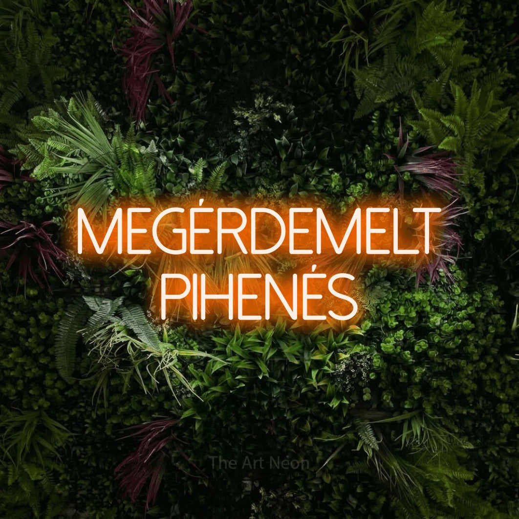 LED neon sign reading “Megérdemelt Pihenés”, arranged in two lines.