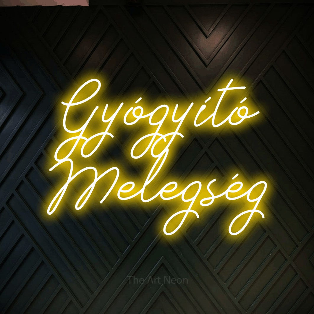 LED neon sign reading “Gyógyító Melegség”, arranged in two lines.