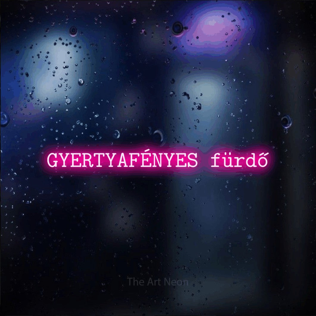 LED neon sign reading “GYERTYAFÉNYES fürdő”, arranged in a single line.