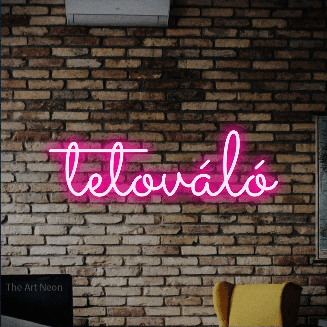 LED neon sign reading “tetováló”, arranged in a single line.