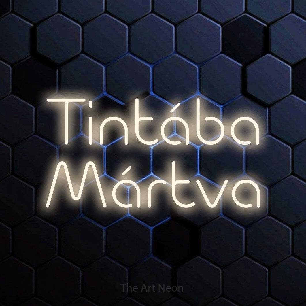 LED neon sign reading “Tintába Mártva”, arranged in two lines.