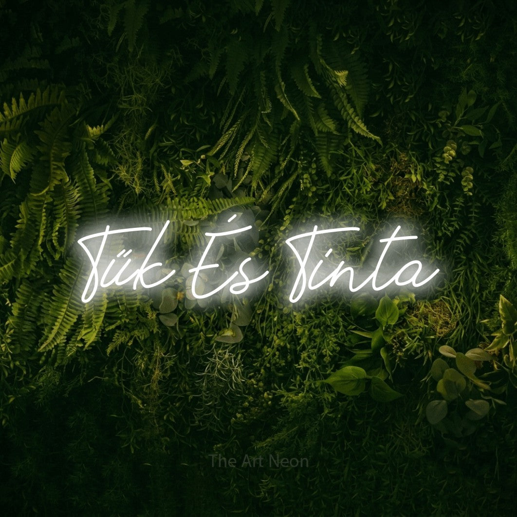 LED neon sign reading “Tűk És Tinta”, arranged in a single line.
