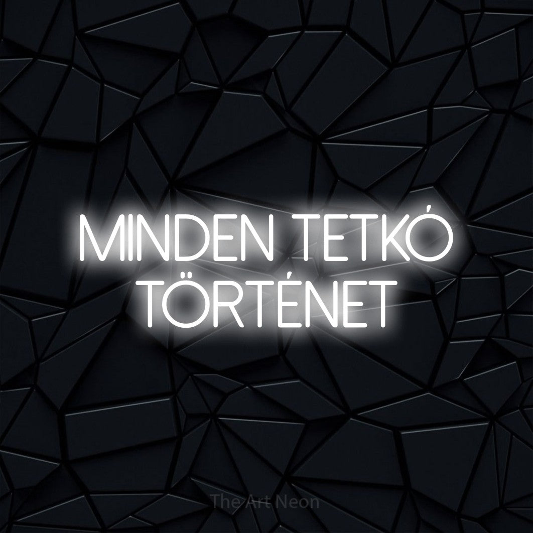LED neon sign reading “Minden Tetkó Történet”, arranged in two lines.