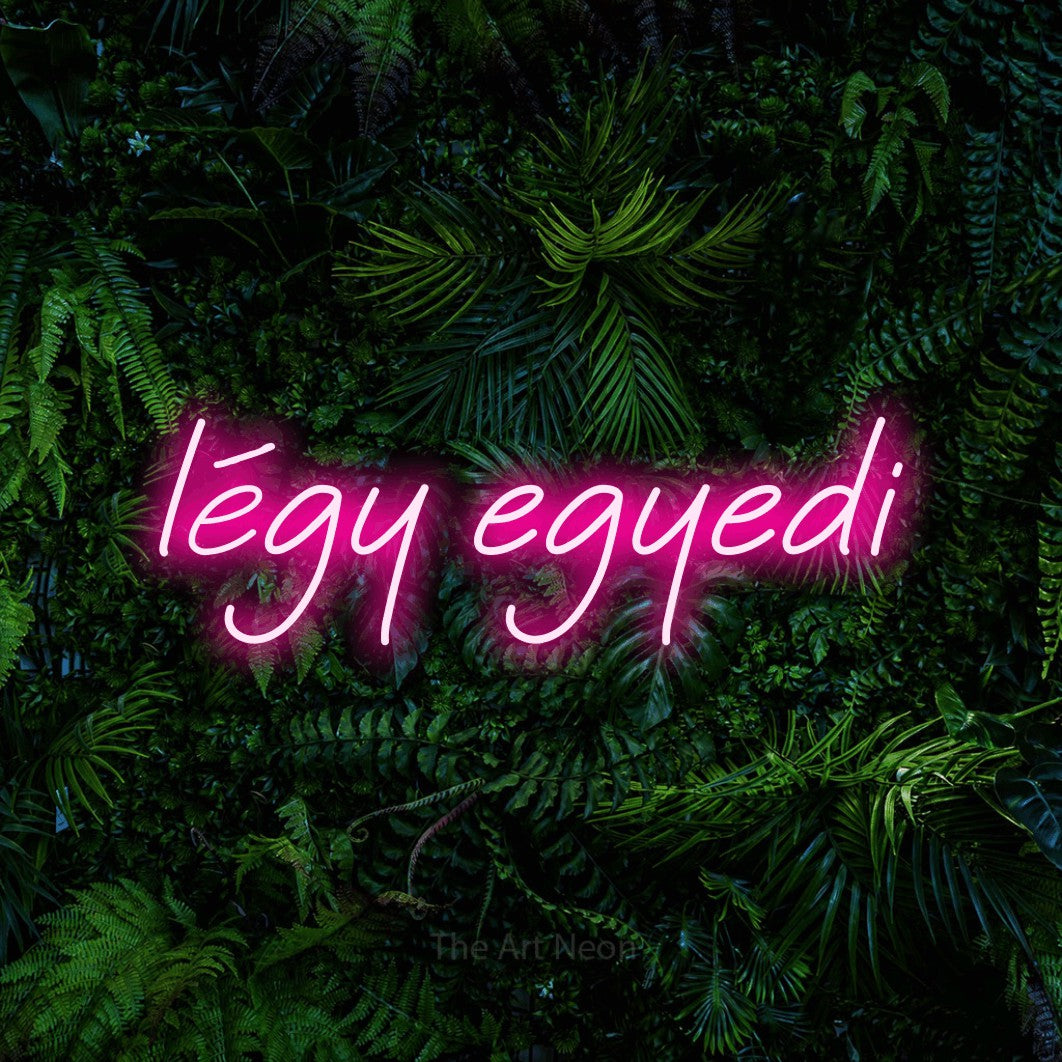 LED neon sign reading “légy egyedi”, arranged in a single line.