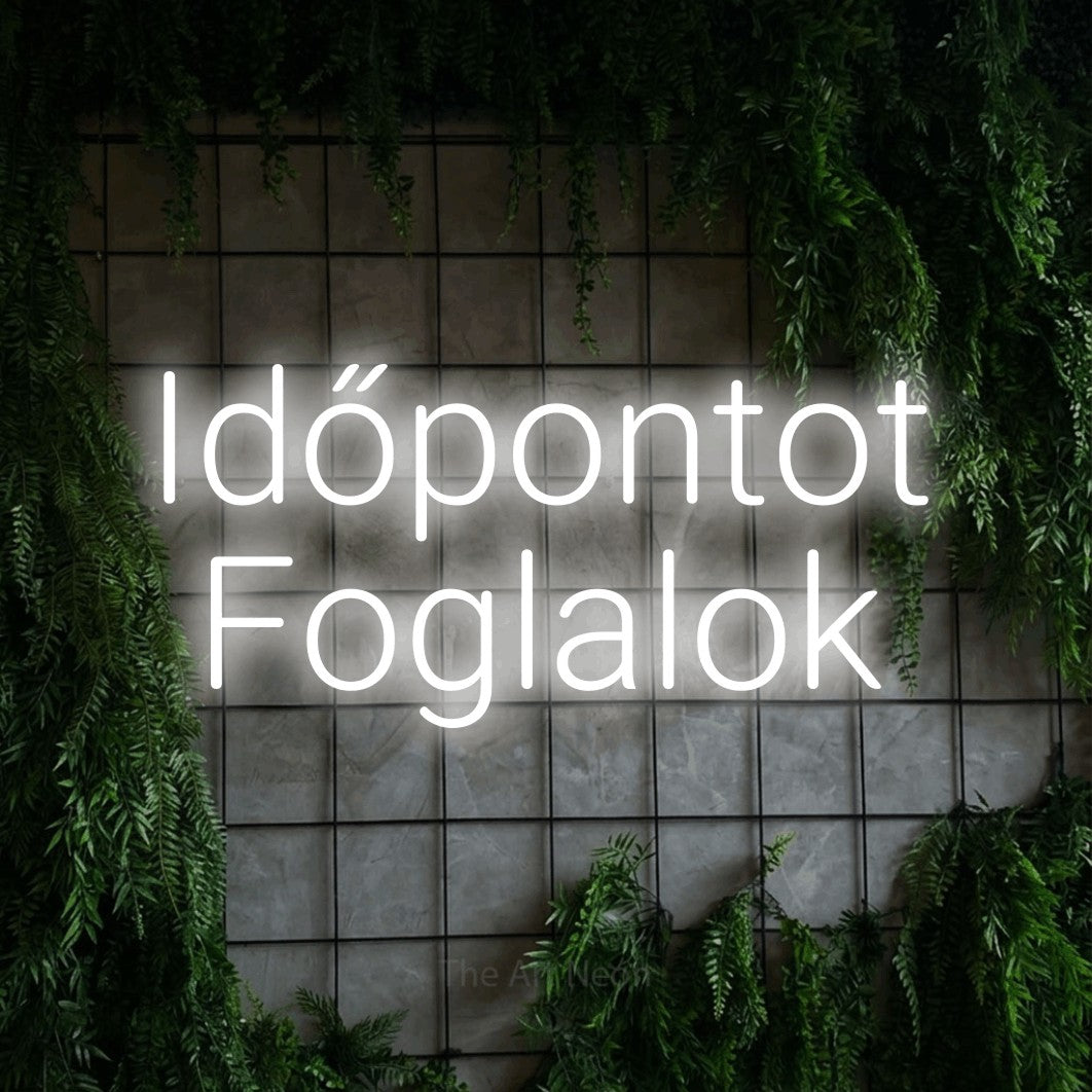 LED neon sign reading “Időpontot Foglalok”, arranged in two lines.