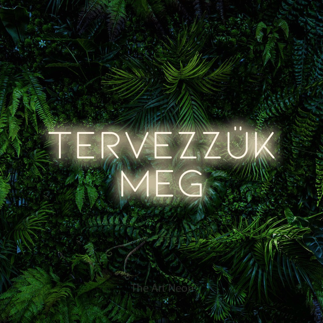 LED neon sign reading “Tervezzük Meg”, arranged in two lines.