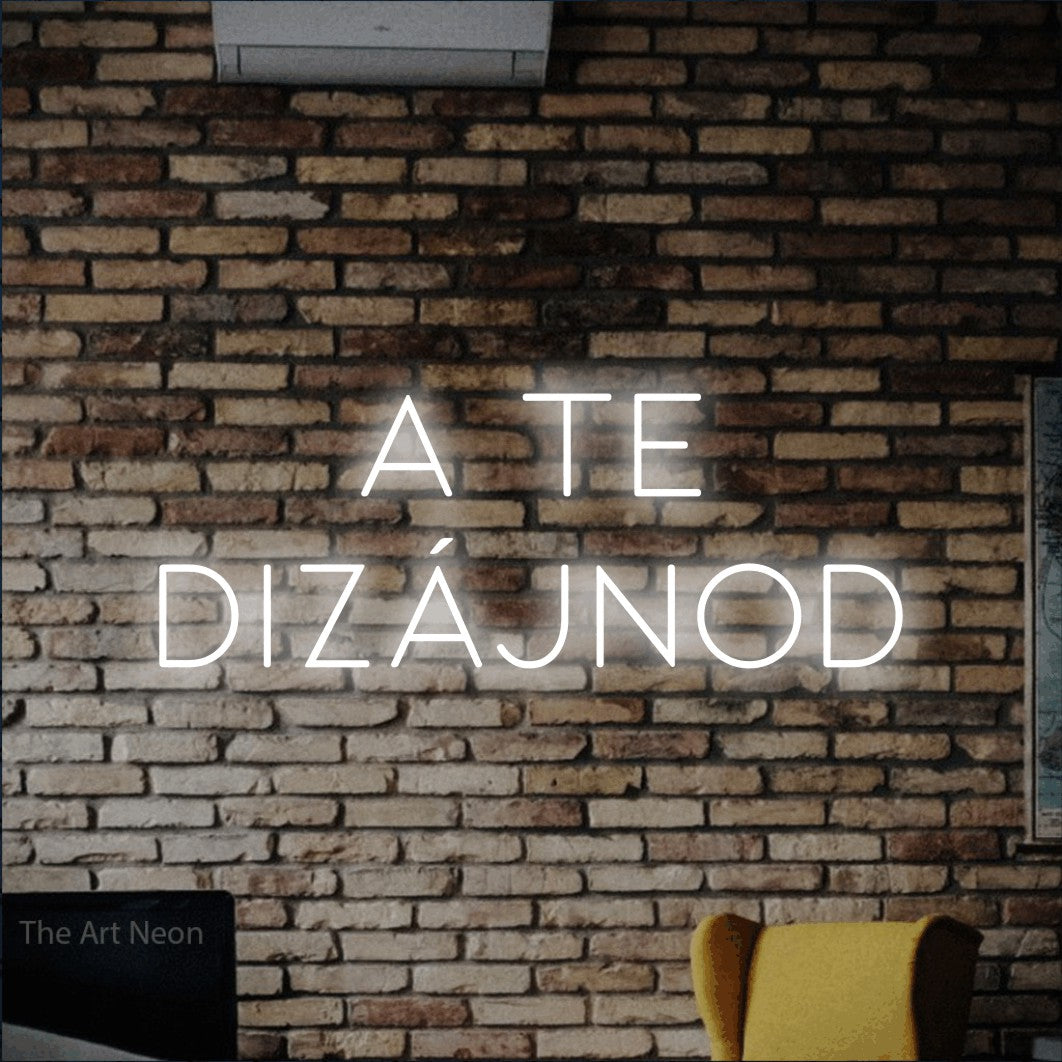 LED neon sign reading “A TE DIZÁJNOD”, arranged in two lines.
