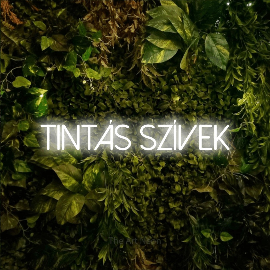 LED neon sign reading “tintás szívek”, arranged in a single line.