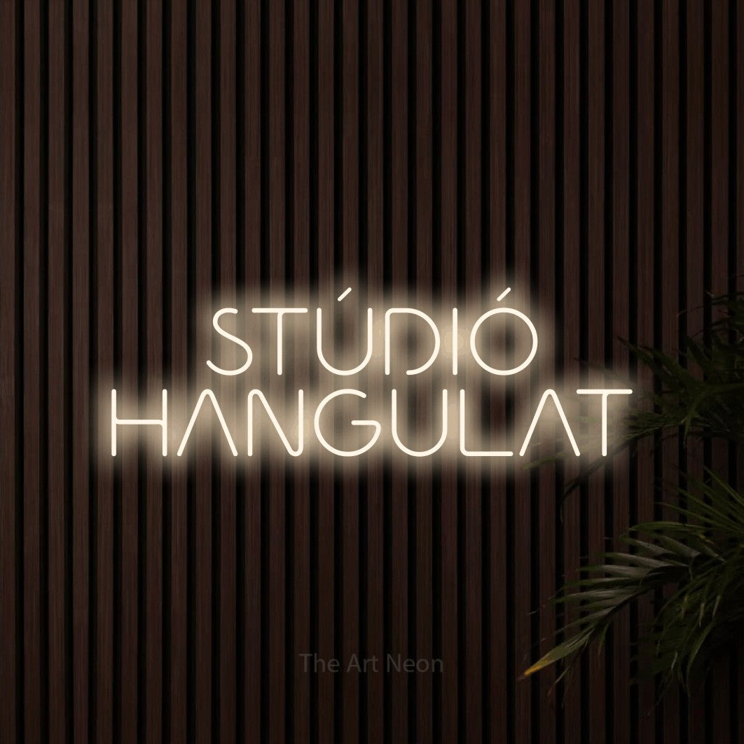 LED neon sign reading “STÚDIÓ HANGULAT”, arranged in two lines.