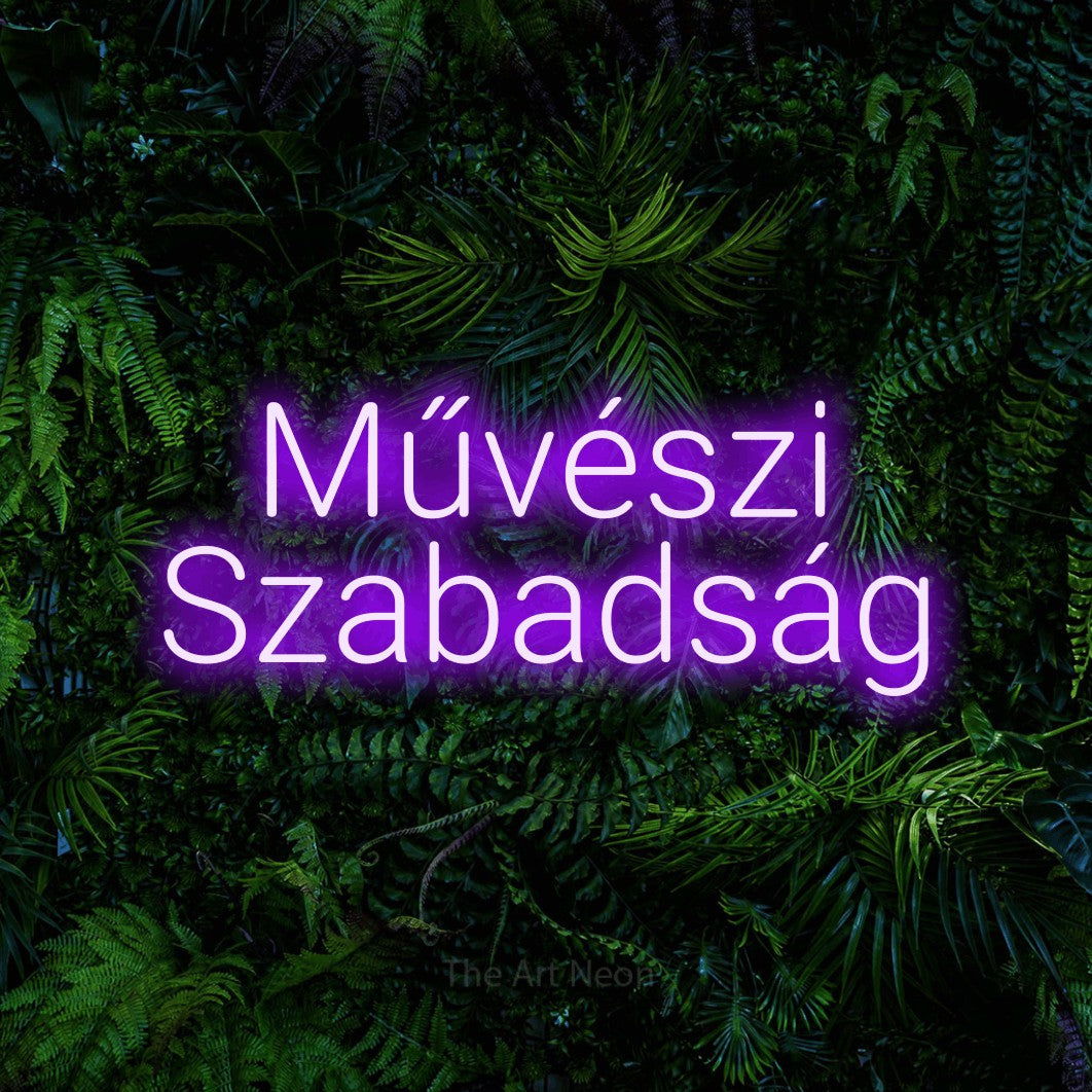 LED neon sign reading “Művészi Szabadság”, arranged in two lines.