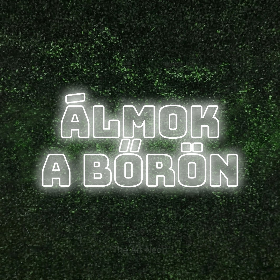 LED neon sign reading “ÁLMOK a bőrön”, arranged in two lines.