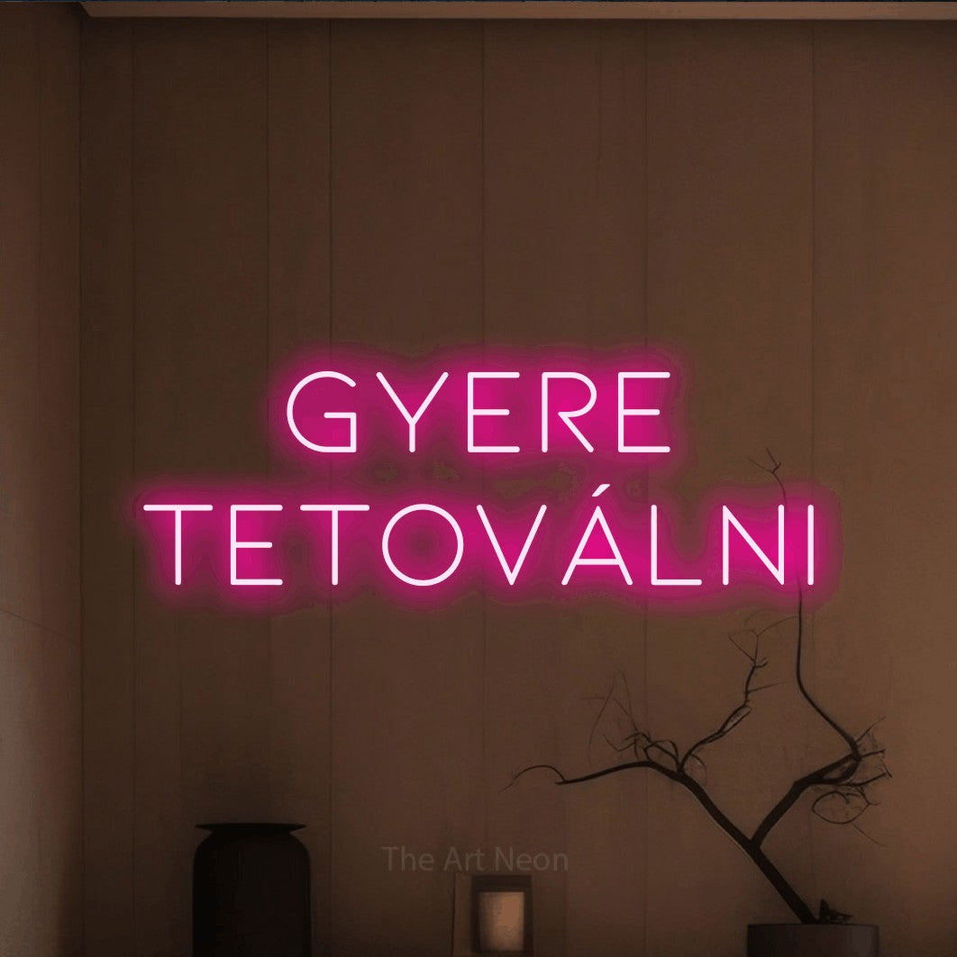 LED neon sign reading “gyere TETOVÁLNI”, arranged in two lines.