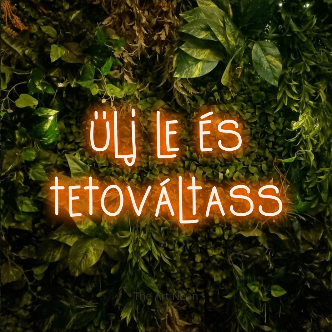 LED neon sign reading “ülj le és tetováltass”, arranged in two lines.