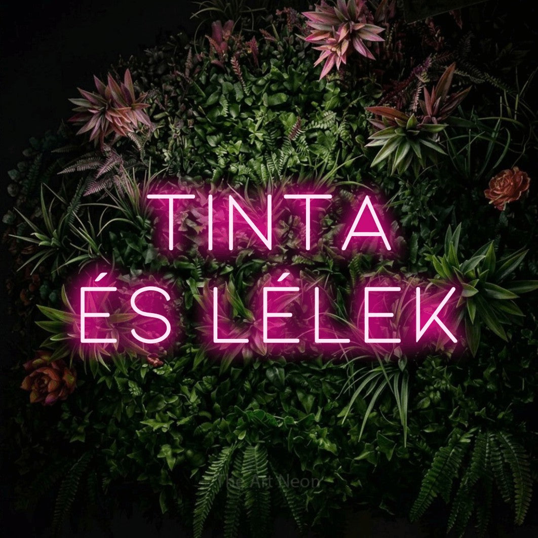 LED neon sign reading “Tinta és lélek”, arranged in two lines.