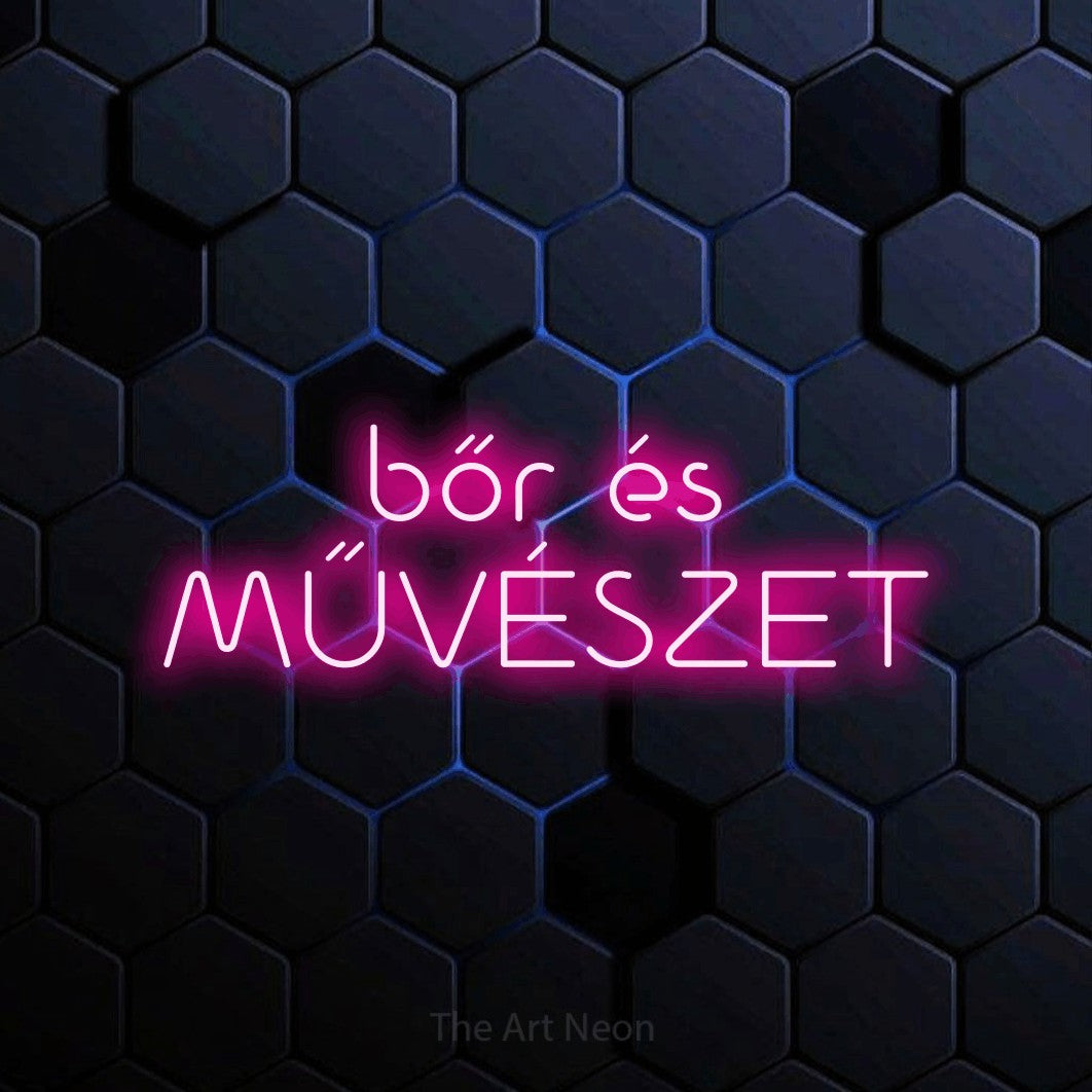 LED neon sign reading “bőr és MŰVÉSZET”, arranged in two lines.
