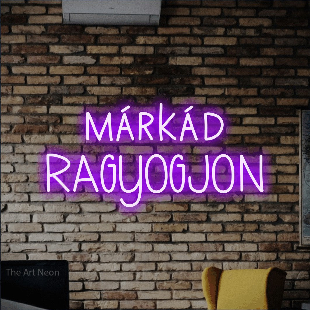 LED neon sign reading “márkád RAGYOGJON”, arranged in two lines.