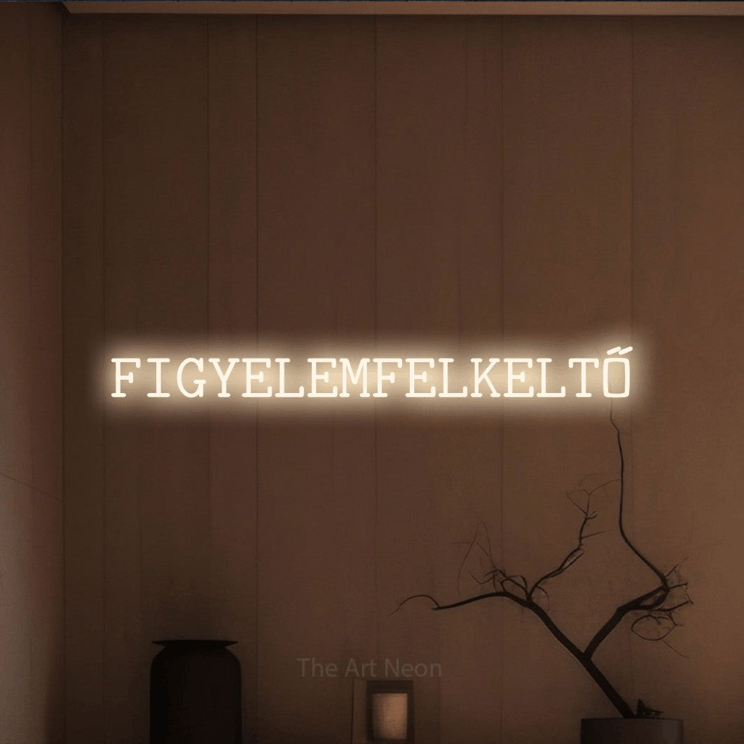 LED neon sign reading “FIGYELEMFELKELTŐ”, arranged in a single line.