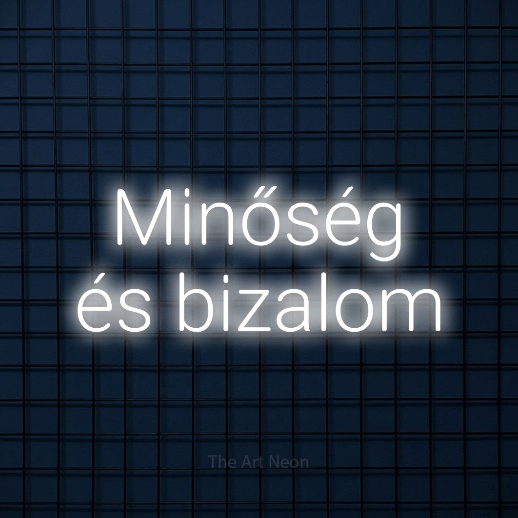 LED neon sign reading “Minőség és bizalom”, arranged in two lines.
