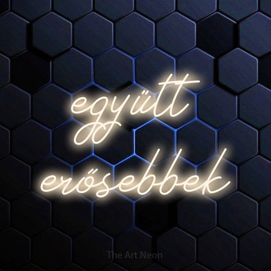 LED neon sign reading “együtt erősebbek”, arranged in two lines.