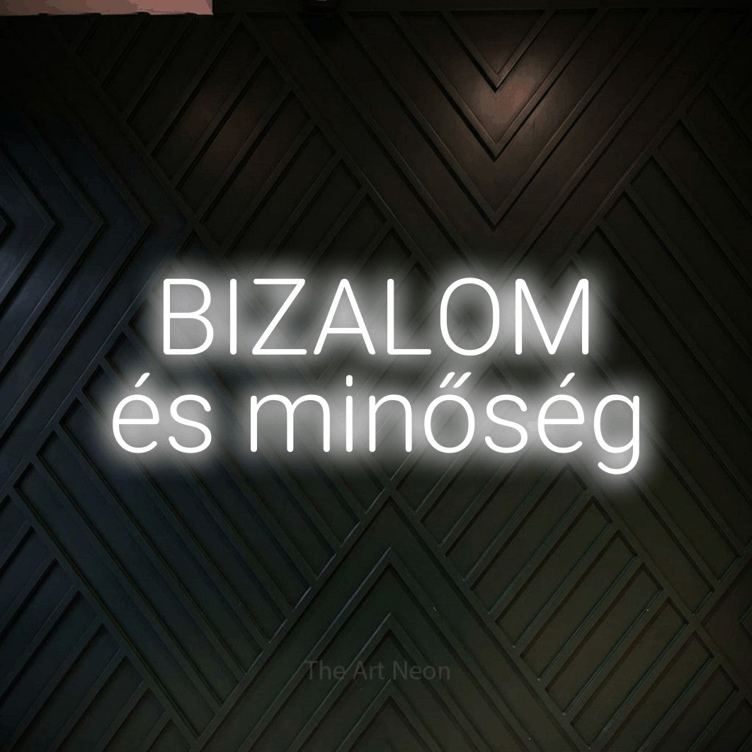 LED neon sign reading “BIZALOM és minőség”, arranged in two lines.
