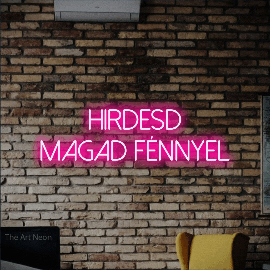 LED neon sign reading “Hirdesd magad fénnyel”, arranged in two lines.