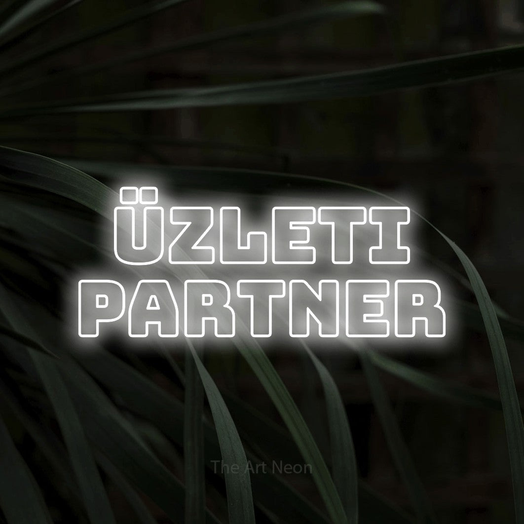 LED neon sign reading “üzleti PARTNER”, arranged in two lines.