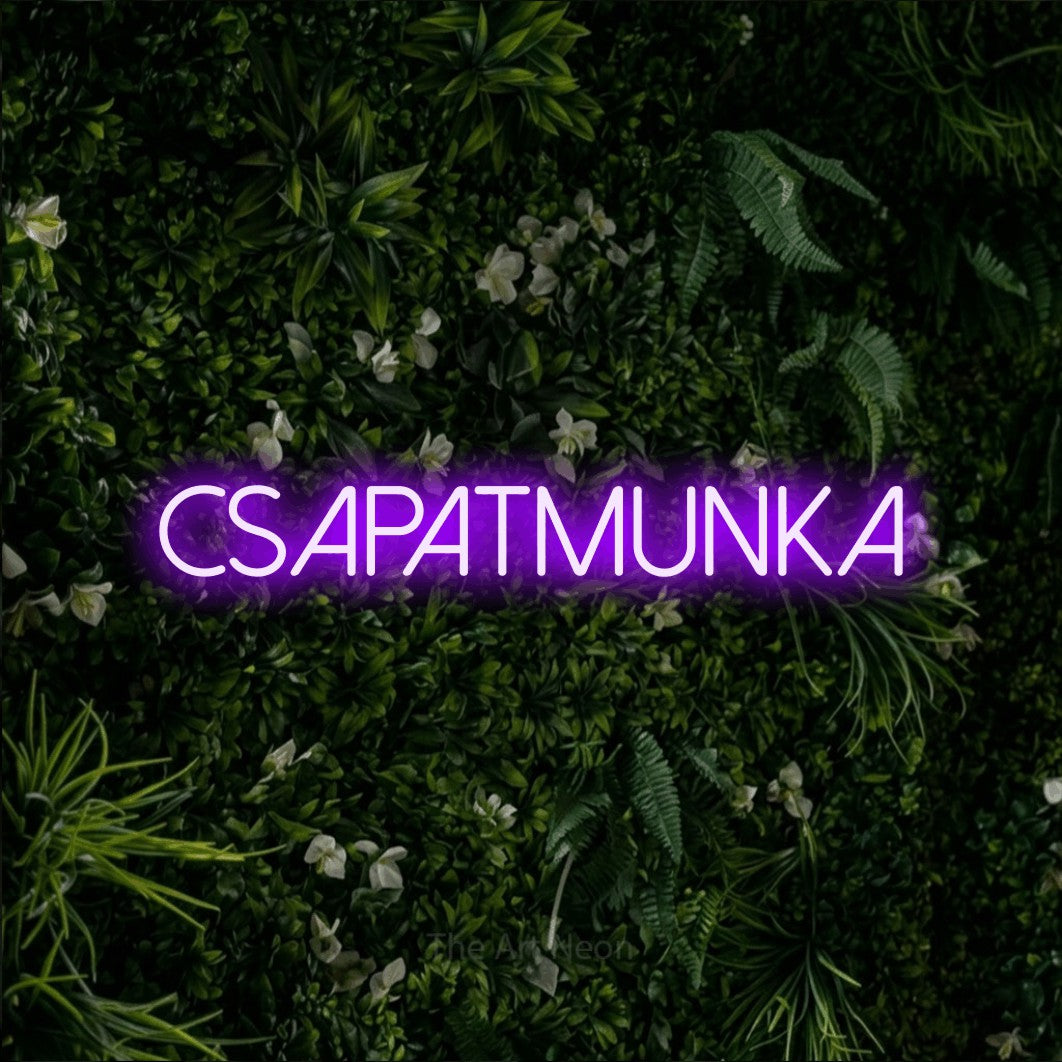LED neon sign reading “CSAPATMUNKA”, arranged in a single line.