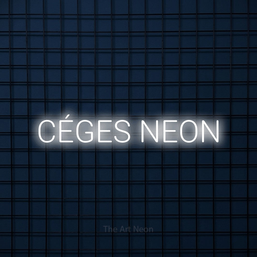 LED neon sign reading “CÉGES NEON”, arranged in a single line.