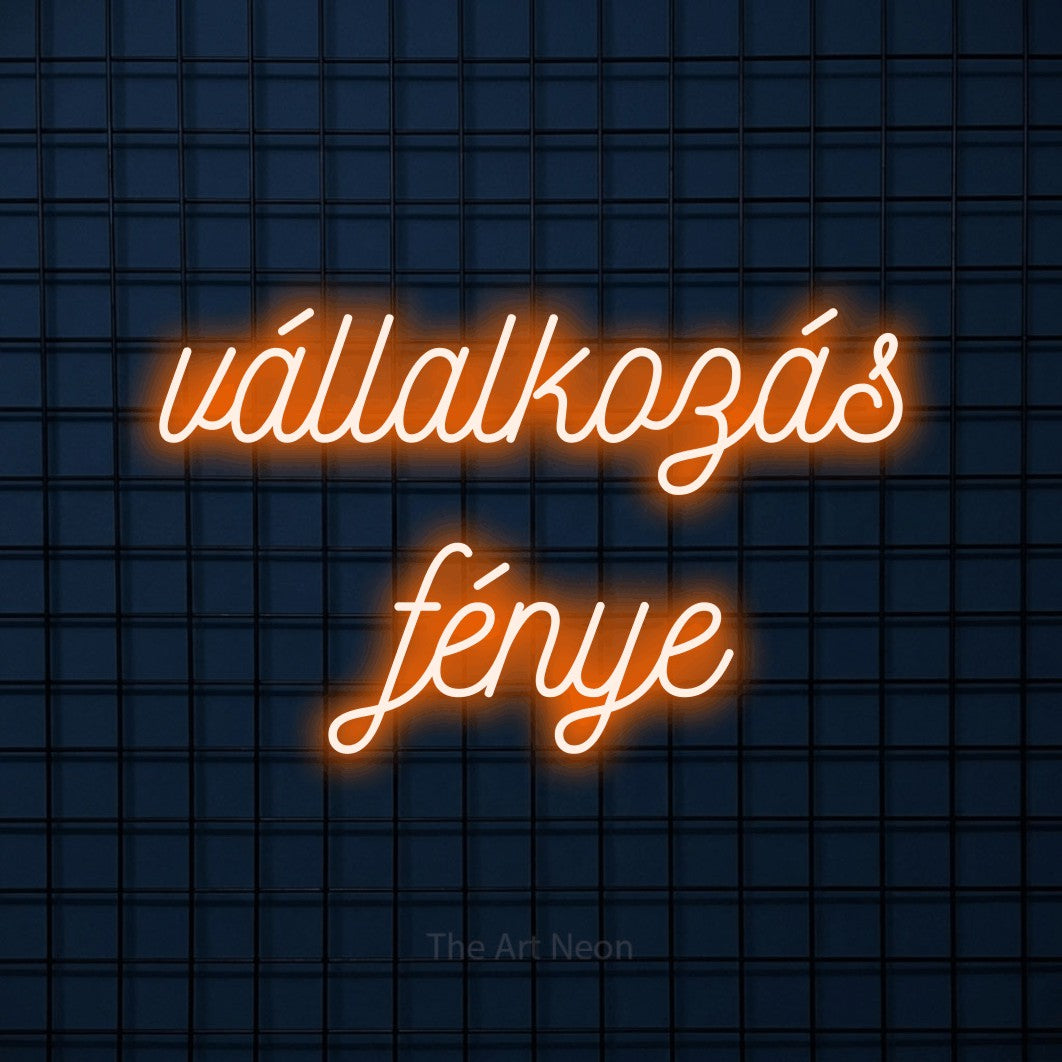 LED neon sign reading “vállalkozás fénye”, arranged in two lines.